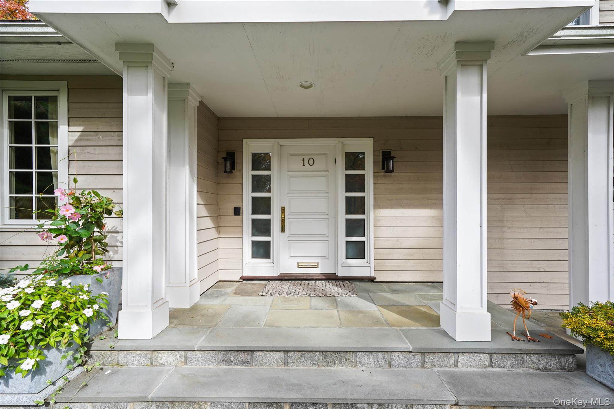 10 Oriole Place Rye Brook, NY 10573 - Photo 36 of 40 a view of a house with entrance