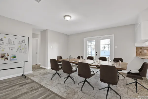 a view of a livingroom with furniture and window
