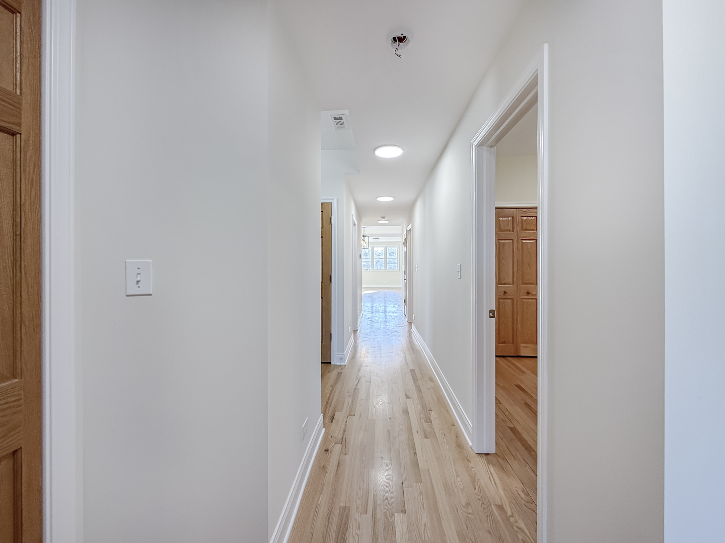 6411 West Irving Park Road, Unit 2 Chicago, IL 60634 - Photo 14 of 21 a view of hallway with wooden floor