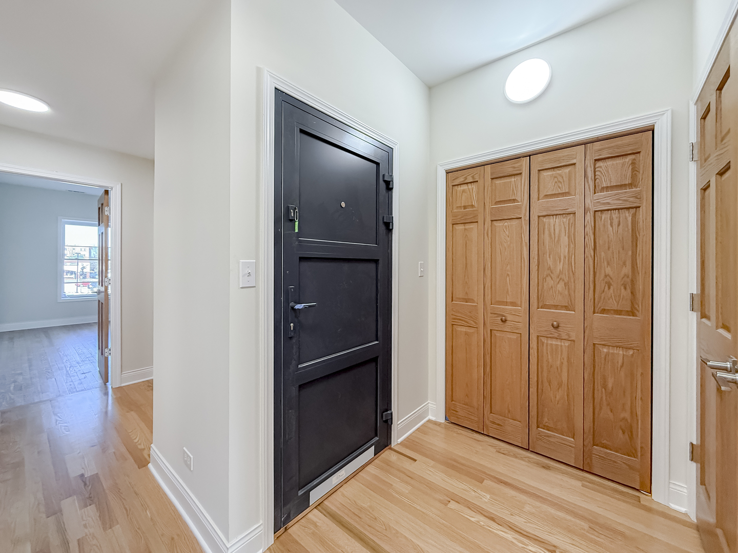 6411 West Irving Park Road, Unit 2 Chicago, IL 60634 - Photo 15 of 21 wooden floor with an entryway door