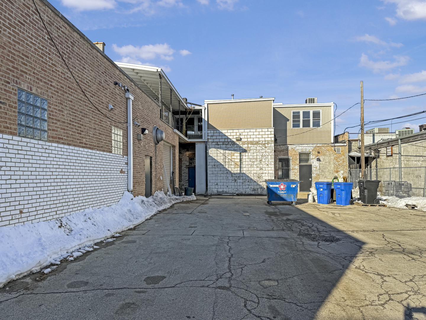 6411 West Irving Park Road, Unit 2 Chicago, IL 60634 - Photo 20 of 21 a view of a building with many windows