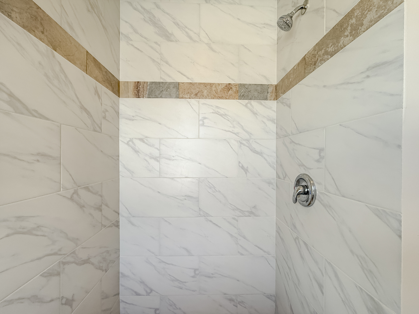 6411 West Irving Park Road, Unit 2 Chicago, IL 60634 - Photo 9 of 21 a bathroom with a shower