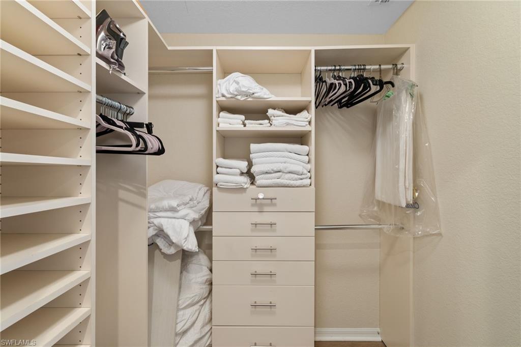 2215 Chesterbrook Court, Unit 2 Naples, FL 34109 - Photo 18 of 38 a view of walk in closet