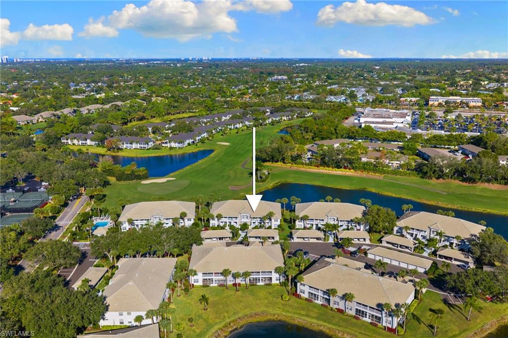 2215 Chesterbrook Court, Unit 2 Naples, FL 34109 - Photo 31 of 38 an aerial view of residential houses with outdoor space