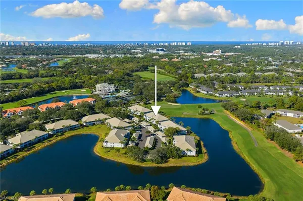 a view of a lake with a city