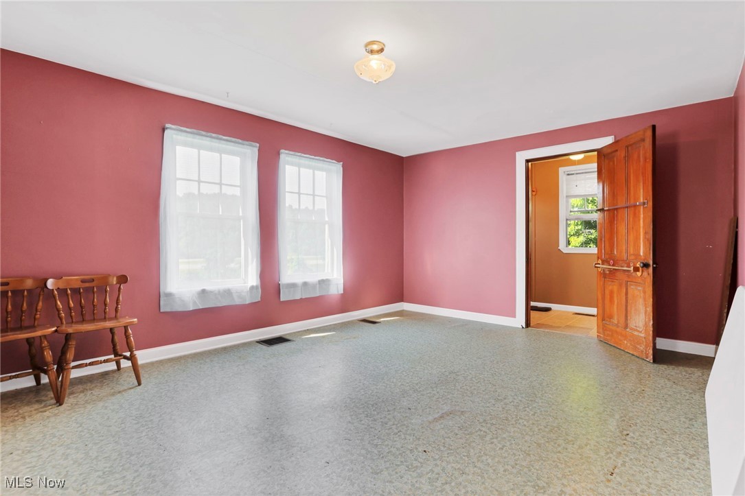 21372 Bridgewater Road Quaker City, OH 43773 - Photo 21 of 39 Empty room featuring baseboards