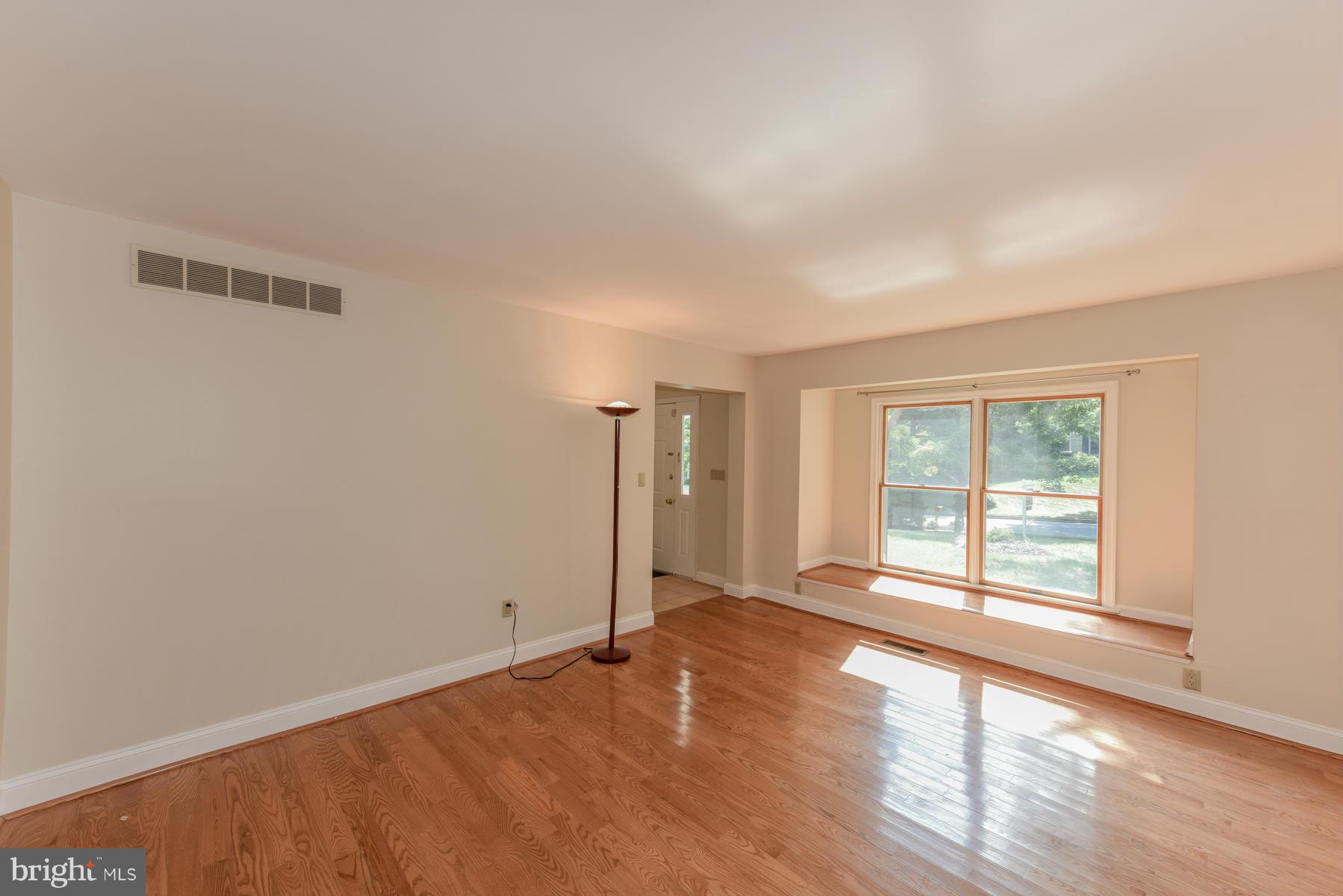 10541 Patuxent Ridge Way Laurel, MD 20723 - Photo 3 of 28 a view of an empty room with a window