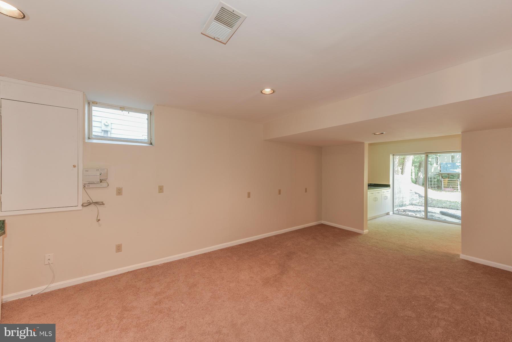 10541 Patuxent Ridge Way Laurel, MD 20723 - Photo 26 of 28 an empty room with windows