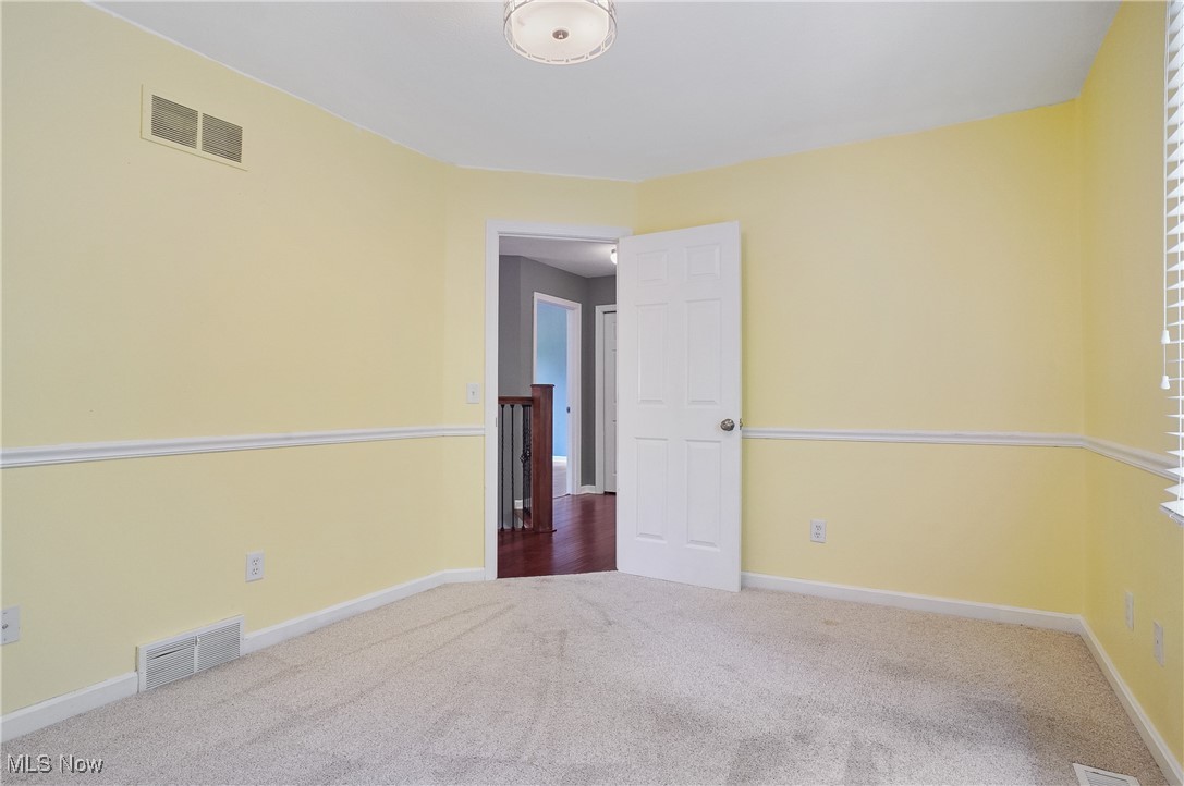 1453 Prospect Road Hudson, OH 44236 - Photo 32 of 50 Empty room with carpet flooring and baseboards