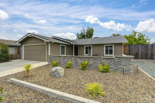 a front view of a house with a porch