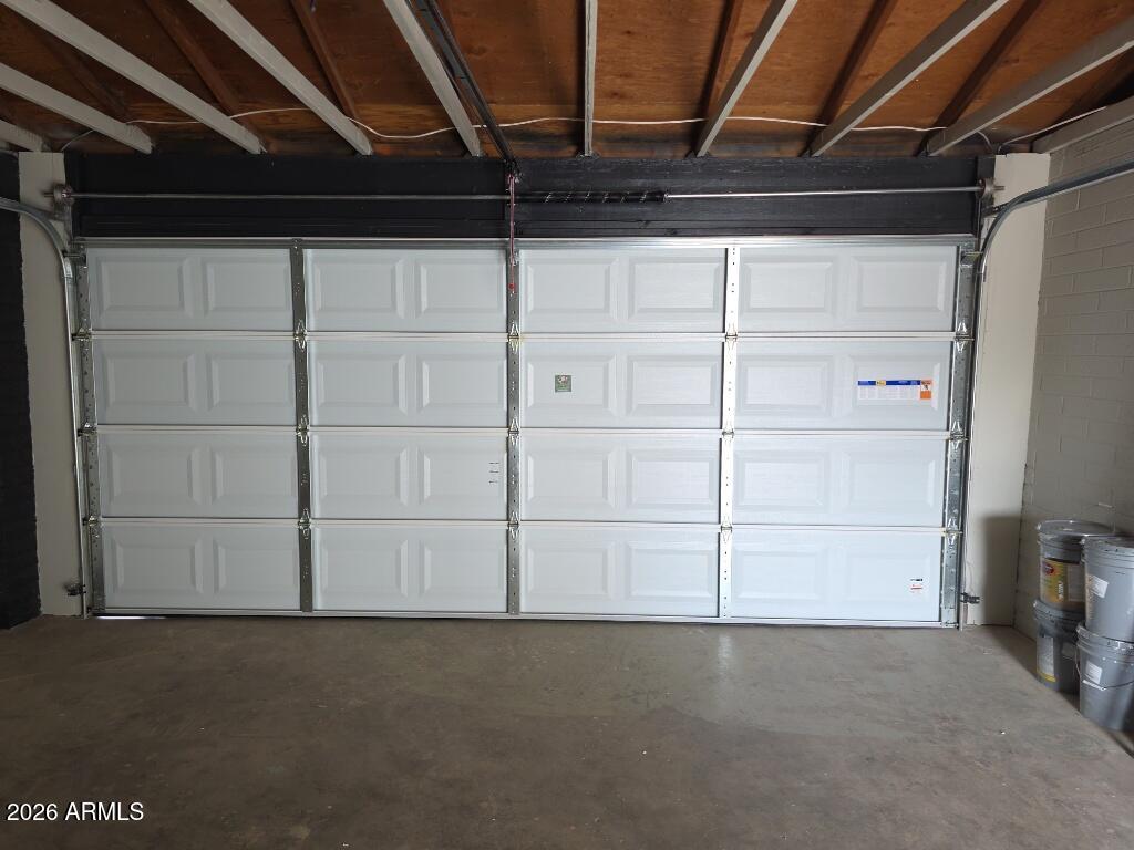 8015 West Roma Avenue Phoenix, AZ 85033 - Photo 13 of 15 a view of a garage
