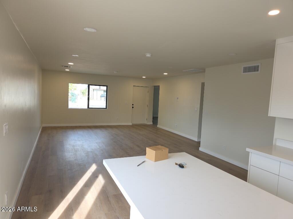 8015 West Roma Avenue Phoenix, AZ 85033 - Photo 4 of 15 a bathroom with a bathtub and a sink