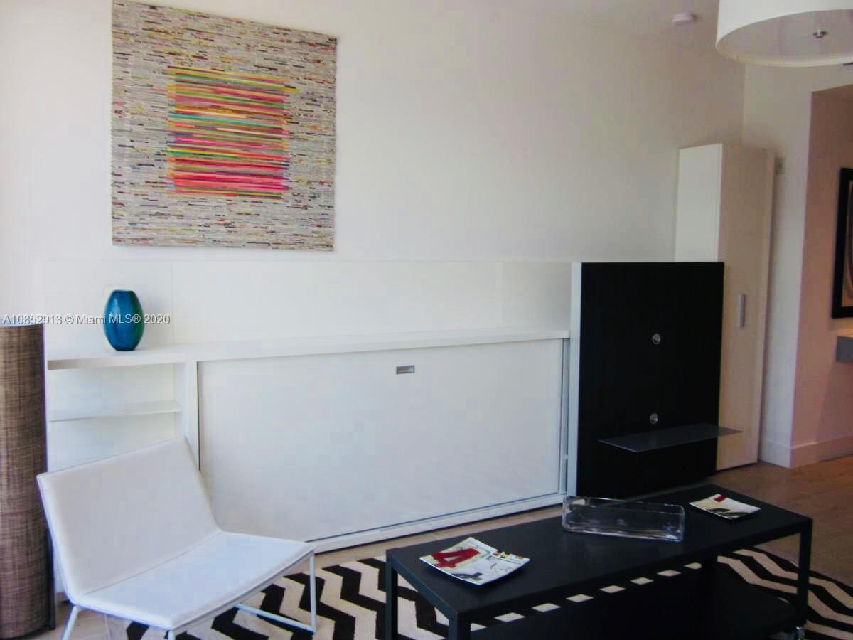 200 23rd Street, Unit 203 Miami Beach, FL 33139 - Photo 17 of 79 a view of a workspace with furniture