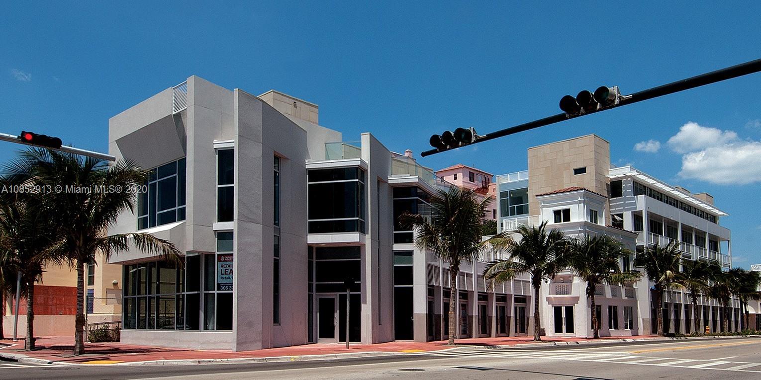 200 23rd Street, Unit 203 Miami Beach, FL 33139 - Photo 2 of 79 a front view of a building with street view