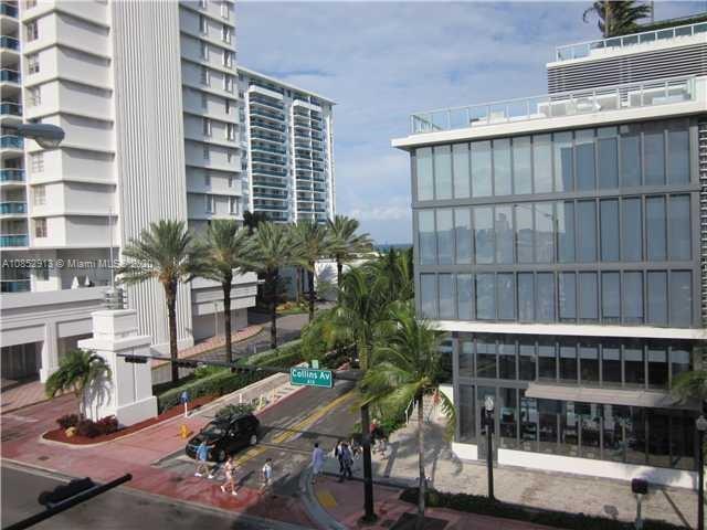 200 23rd Street, Unit 203 Miami Beach, FL 33139 - Photo 33 of 79 a view of balcony with potted plants and wooden floor