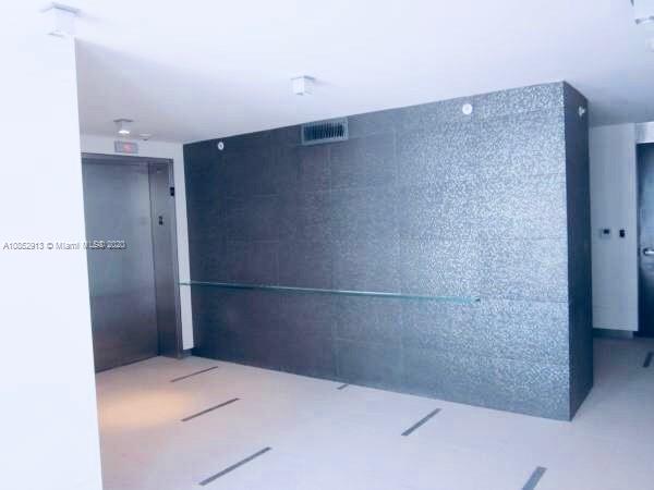 200 23rd Street, Unit 203 Miami Beach, FL 33139 - Photo 9 of 79 a bathroom with a shower