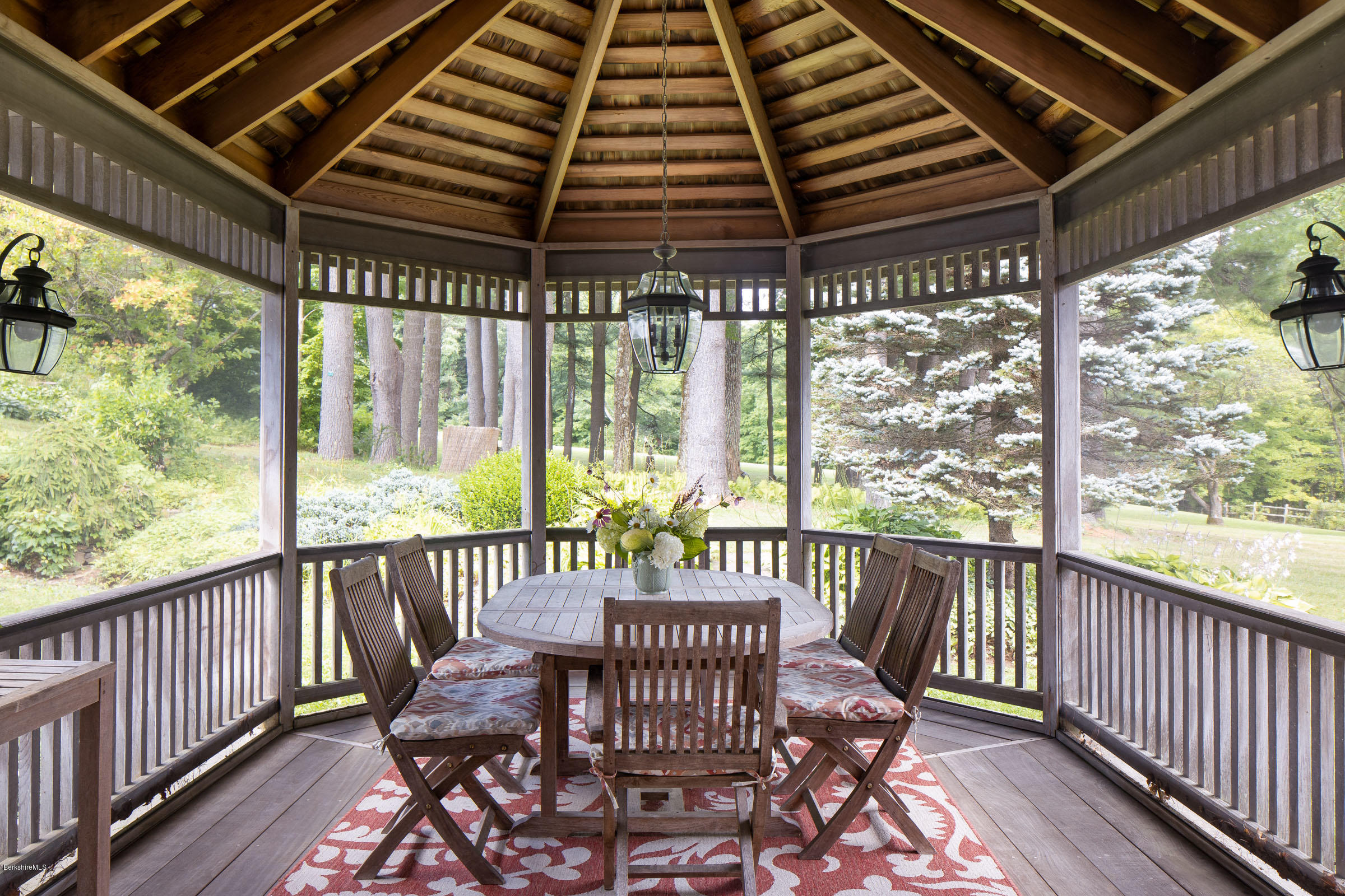 119 Under Mountain Road Lenox, MA 01240 - Photo 11 of 46 a view of a two chairs in the balcony
