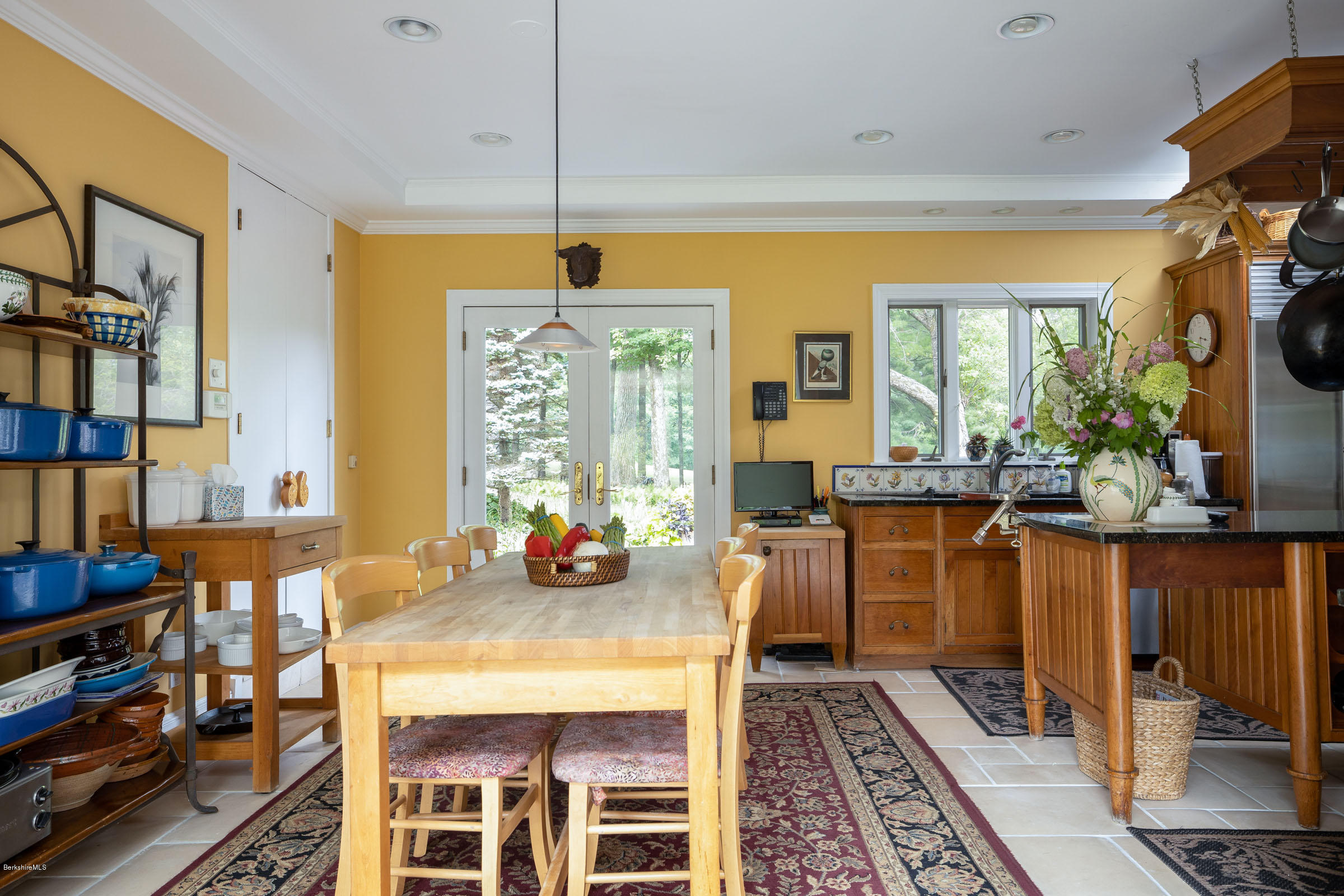 119 Under Mountain Road Lenox, MA 01240 - Photo 13 of 46 a view of a dining room with furniture window and wooden floor