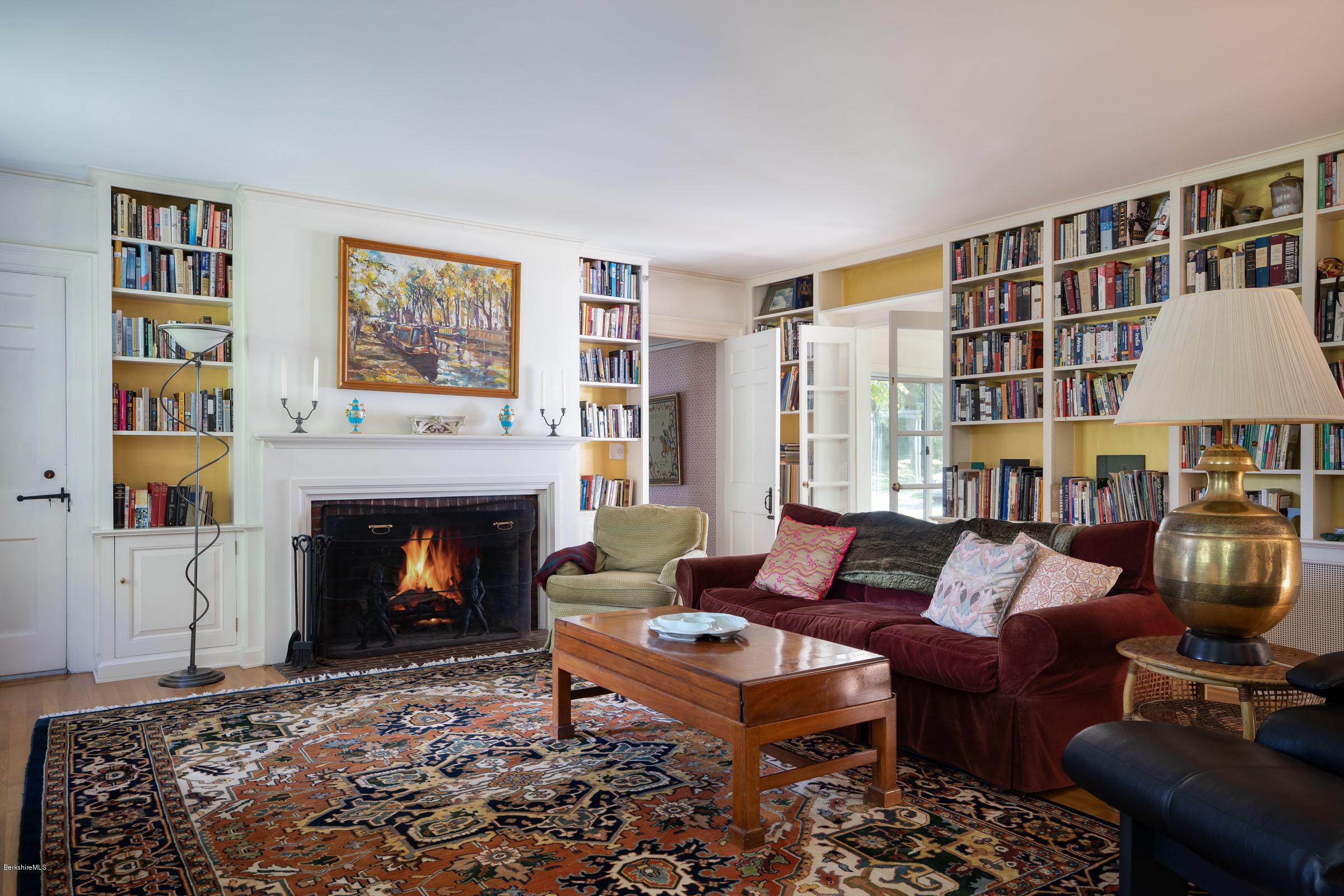119 Under Mountain Road Lenox, MA 01240 - Photo 15 of 46 a living room with furniture and a fireplace
