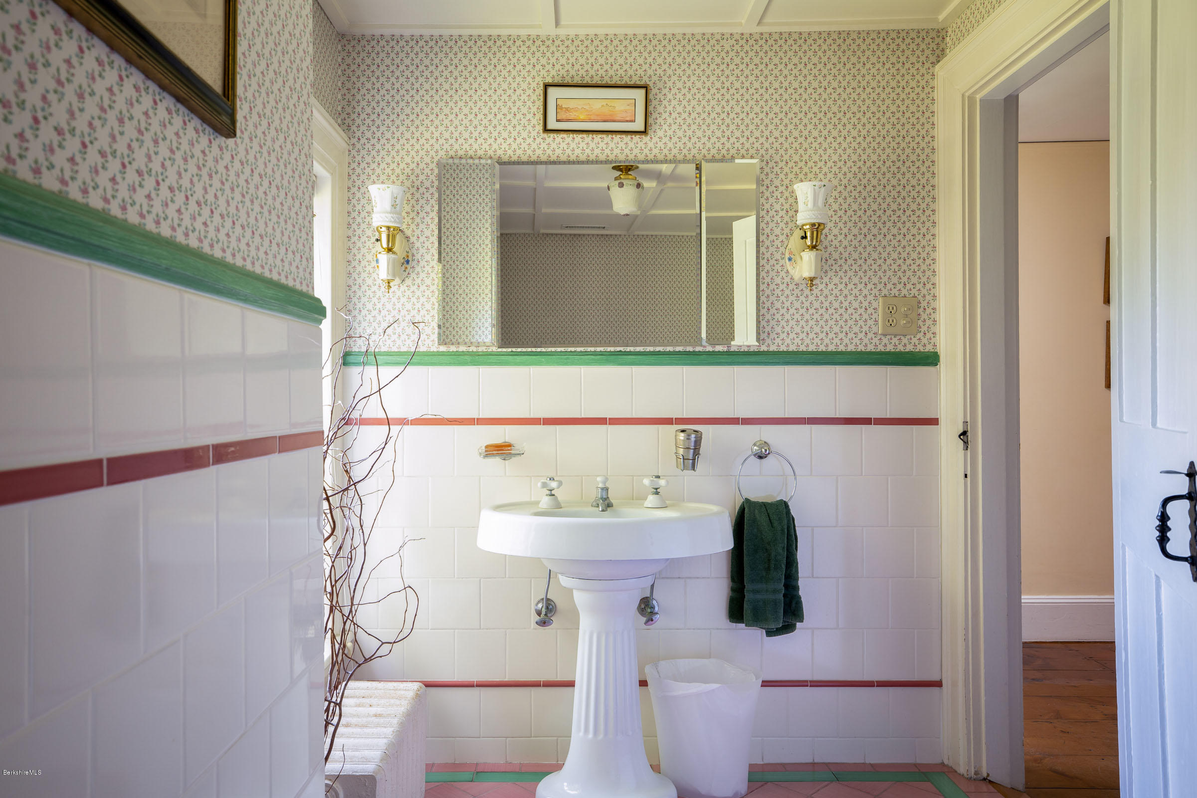 119 Under Mountain Road Lenox, MA 01240 - Photo 19 of 46 a bathroom with a sink and mirror with toilet