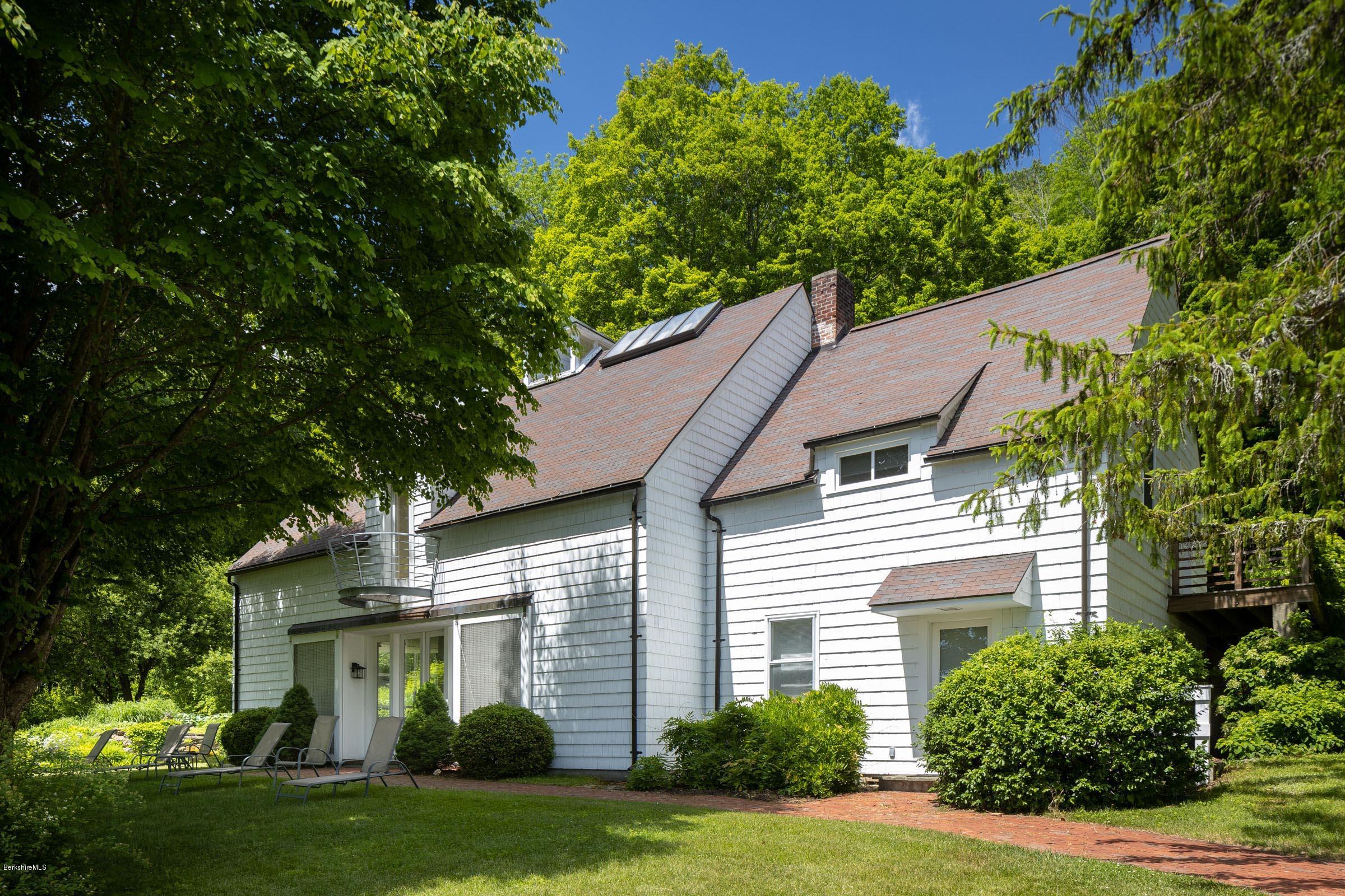 119 Under Mountain Road Lenox, MA 01240 - Photo 29 of 46 a front view of a house with a yard
