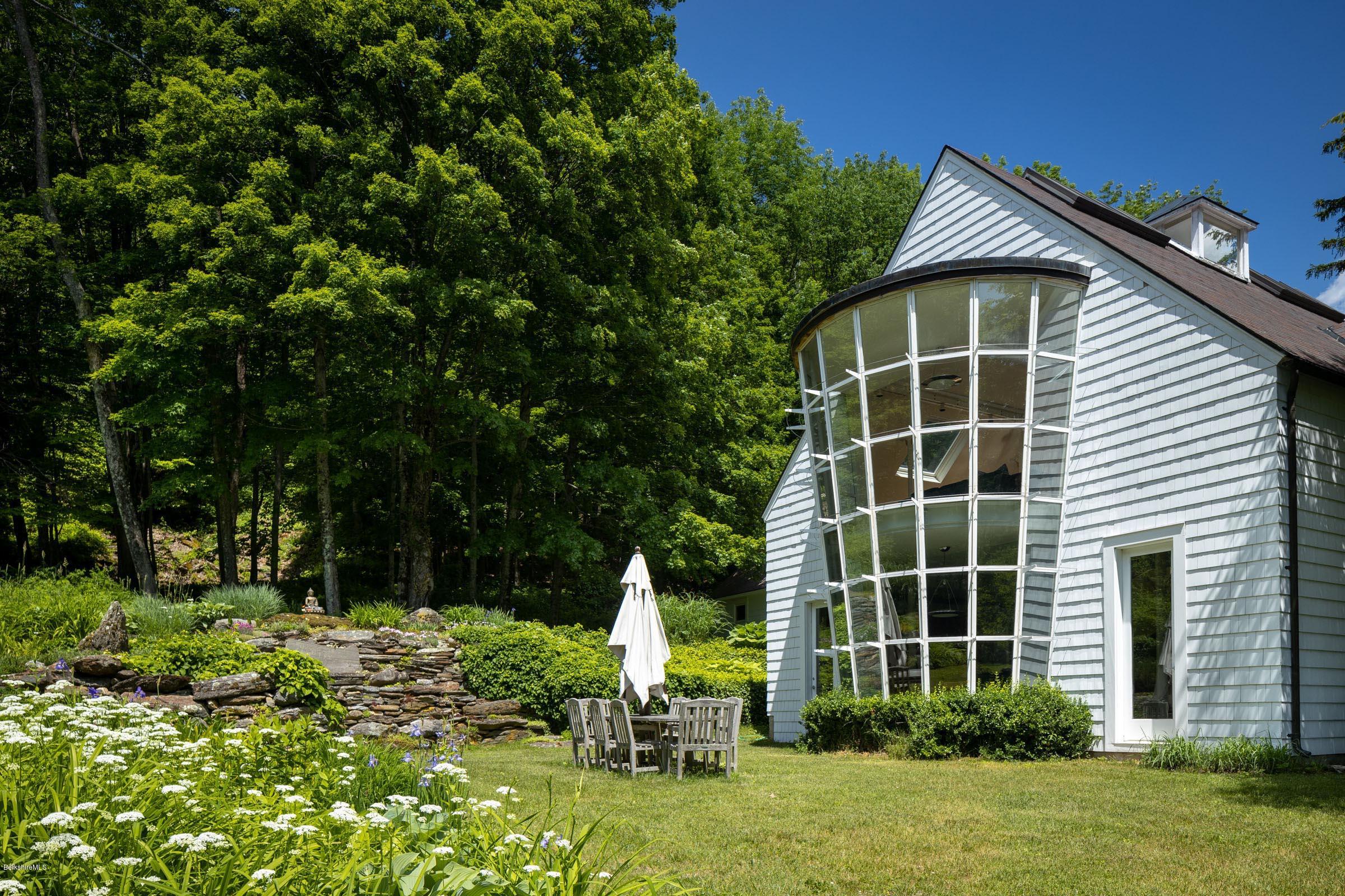 119 Under Mountain Road Lenox, MA 01240 - Photo 4 of 46 a house view with a garden space