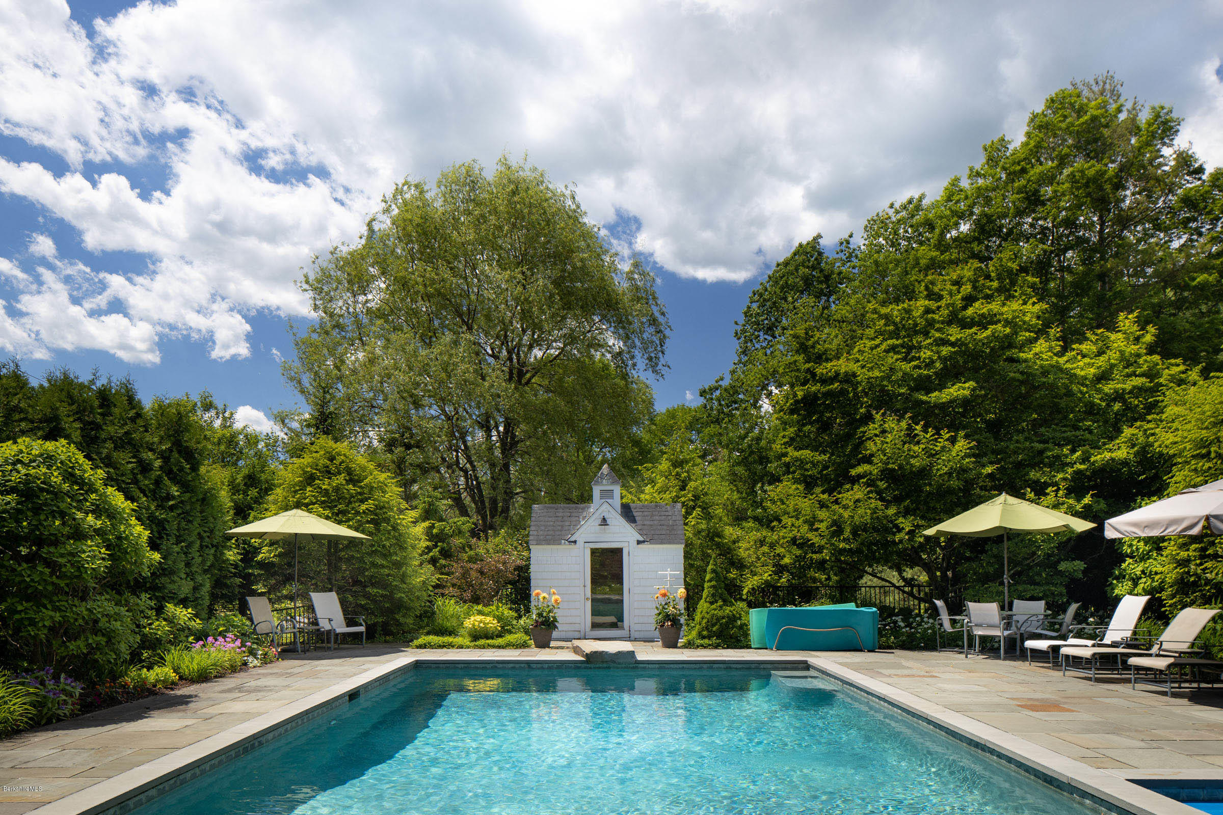 119 Under Mountain Road Lenox, MA 01240 - Photo 5 of 46 a view of a house with a yard and sitting area