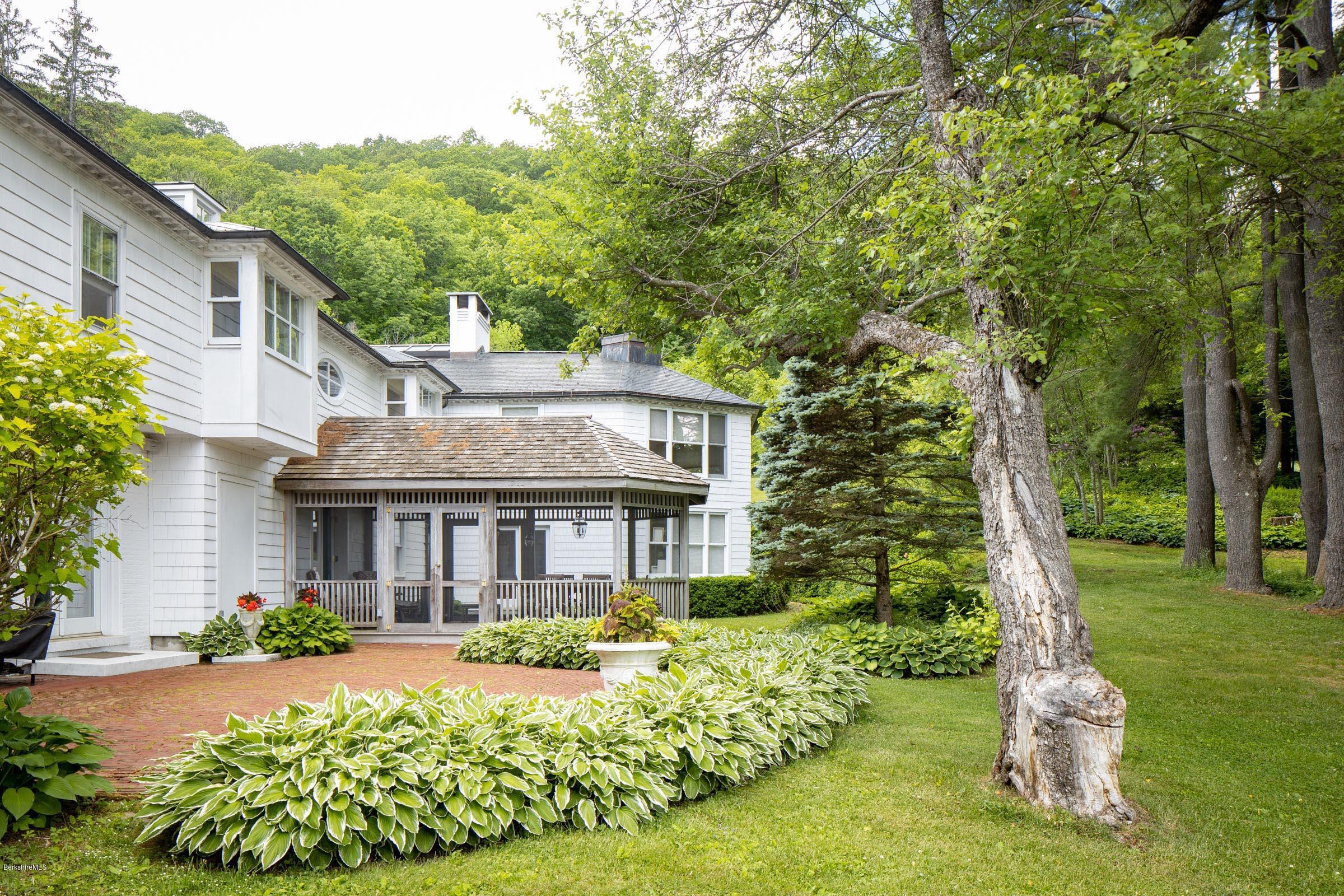 119 Under Mountain Road Lenox, MA 01240 - Photo 42 of 46 a front view of a house with a yard