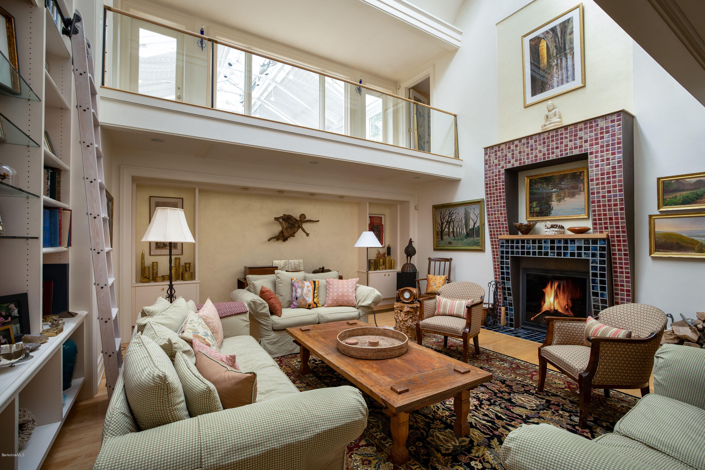119 Under Mountain Road Lenox, MA 01240 - Photo 8 of 46 a living room with furniture fireplace and a window