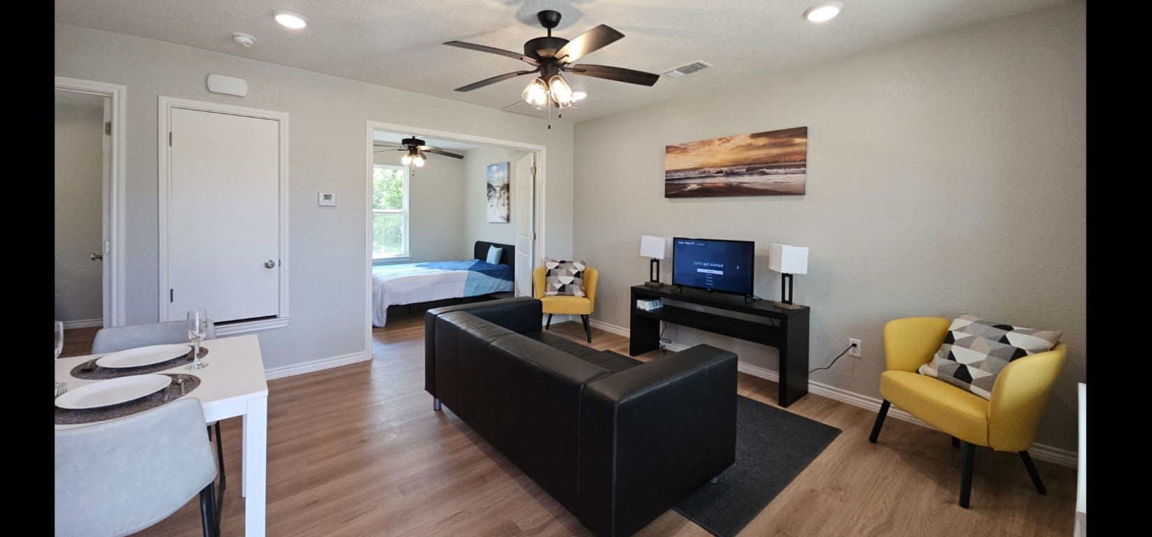 1701 Sycamore Street Temple, TX 76502 - Photo 11 of 20 a living room with furniture and a flat screen tv