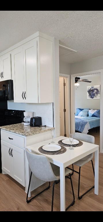 1701 Sycamore Street Temple, TX 76502 - Photo 10 of 20 a kitchen with a table and chairs in it