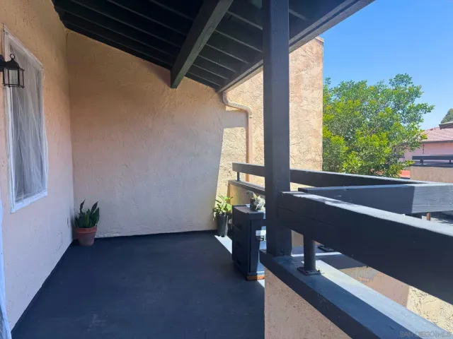 a view of a room with a window