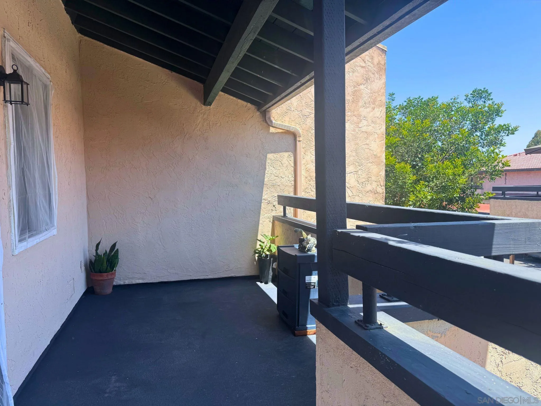 875 West San Ysidro Boulevard, Unit 14 San Ysidro, CA 92173 - Photo 11 of 21 a view of a room with a window