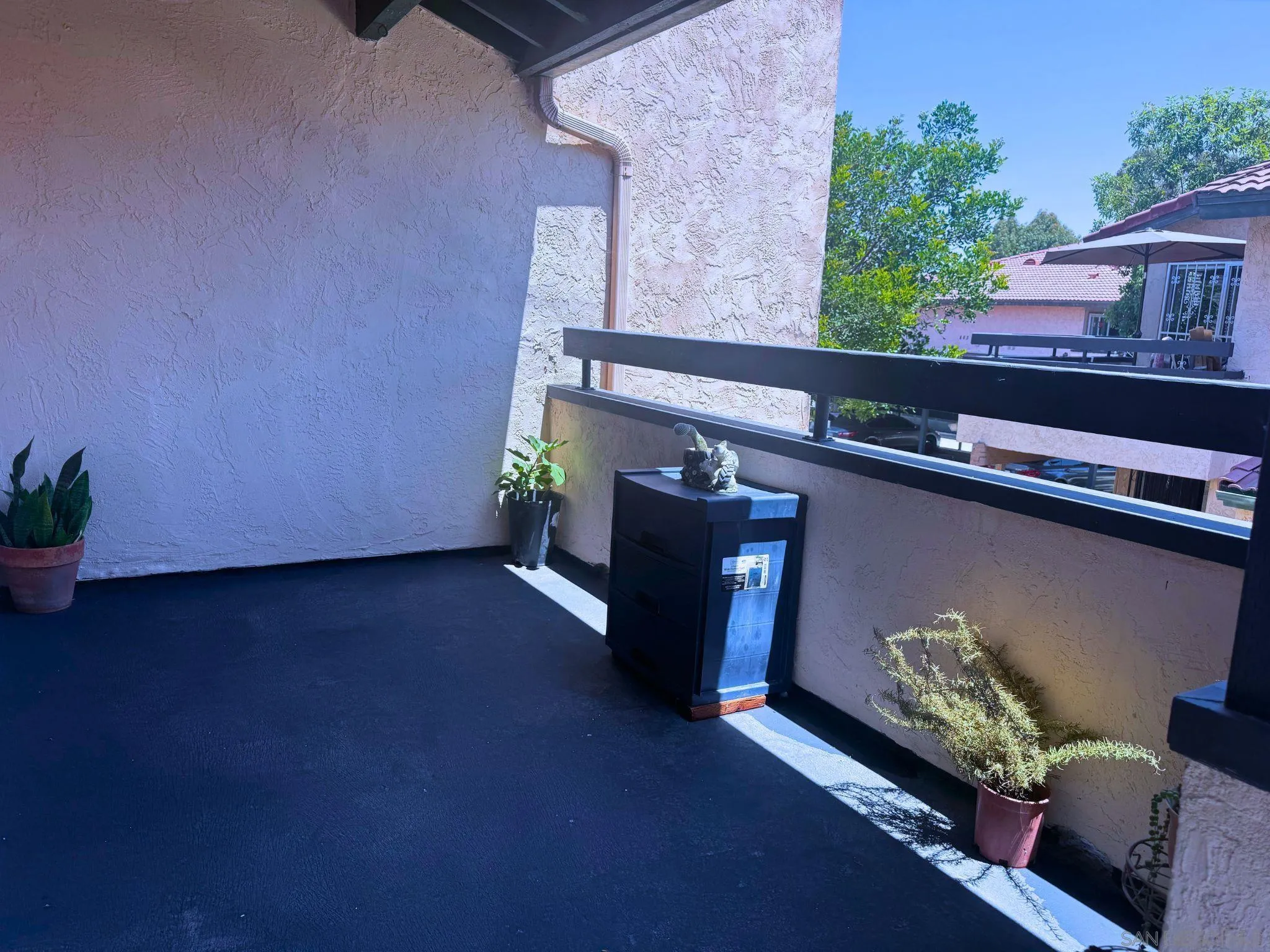 875 West San Ysidro Boulevard, Unit 14 San Ysidro, CA 92173 - Photo 13 of 21 a close view of chair and table in a room