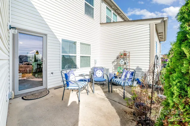 a view of a dinning tables and chairs in the patio