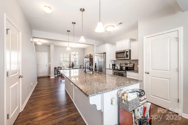 a view of a kitchen and living room