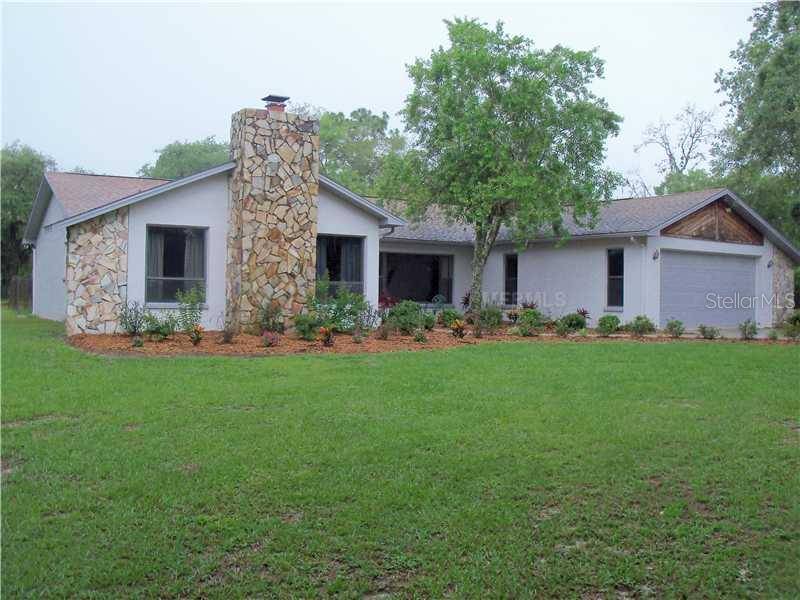 14306 Hicks Road Hudson, FL 34669 - Photo 1 of 1 Exterior Front