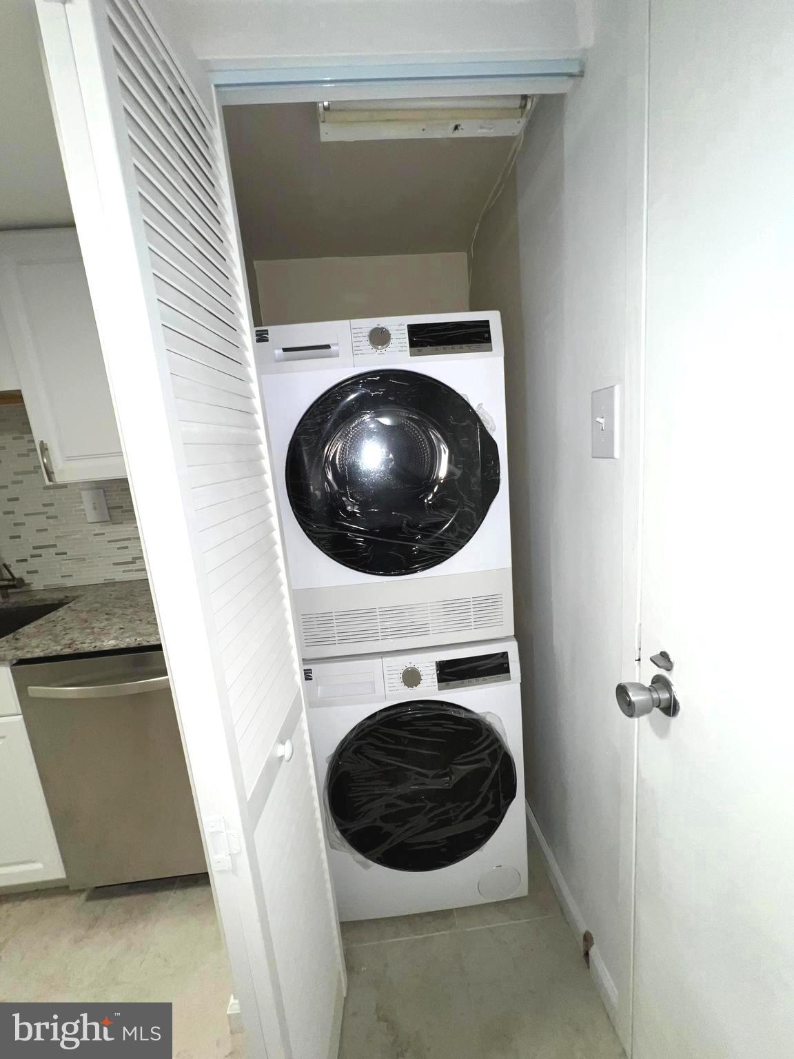 1515 South Arlington Ridge Road, Unit 703 Arlington, VA 22202 - Photo 21 of 44 a utility room with dryer and washer