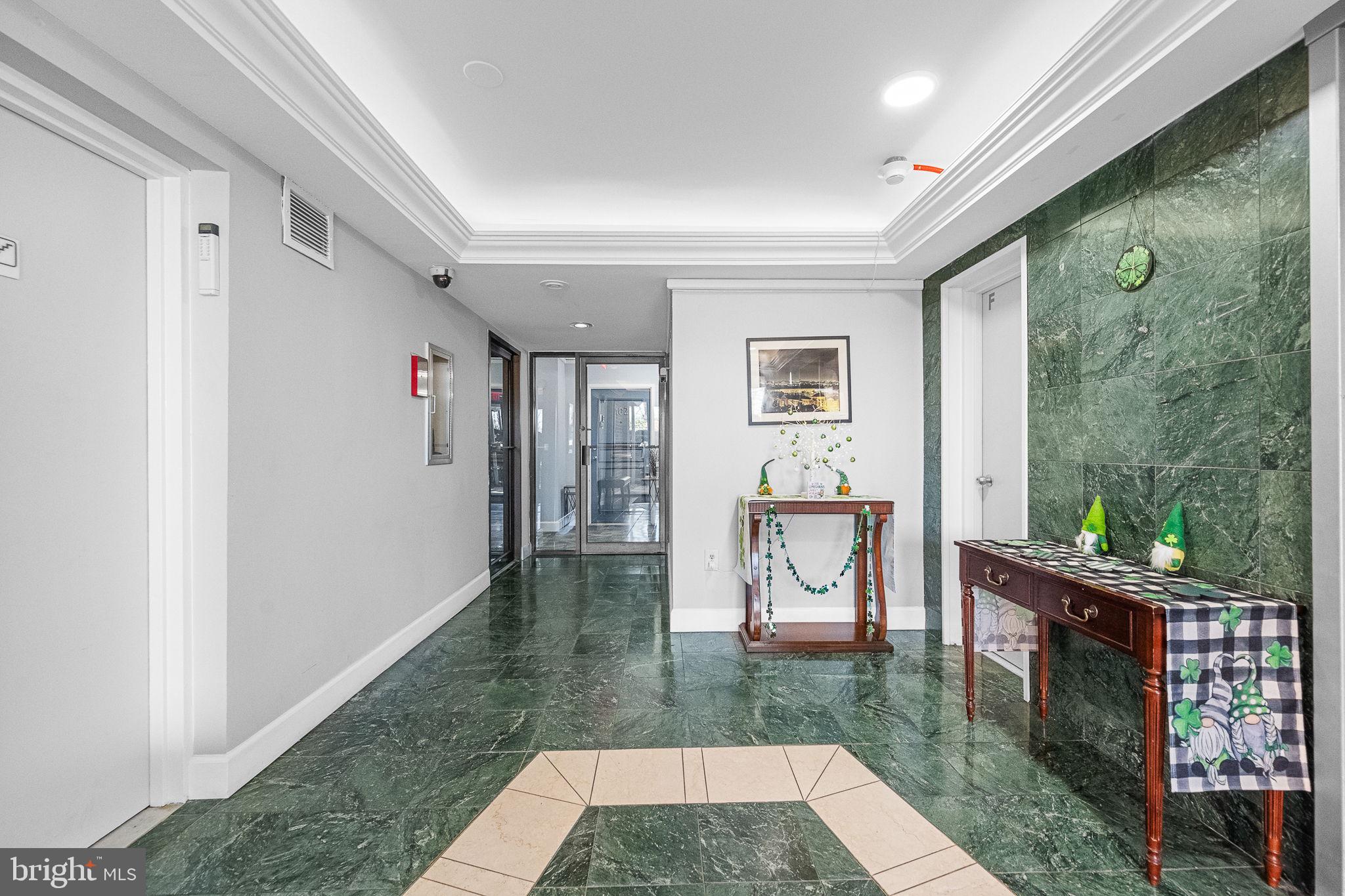 1515 South Arlington Ridge Road, Unit 703 Arlington, VA 22202 - Photo 6 of 44 a view of an entryway door and an outdoor space