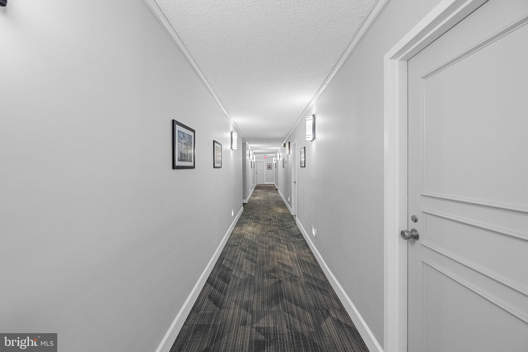 1515 South Arlington Ridge Road, Unit 703 Arlington, VA 22202 - Photo 9 of 44 a view of a hallway with a stairs