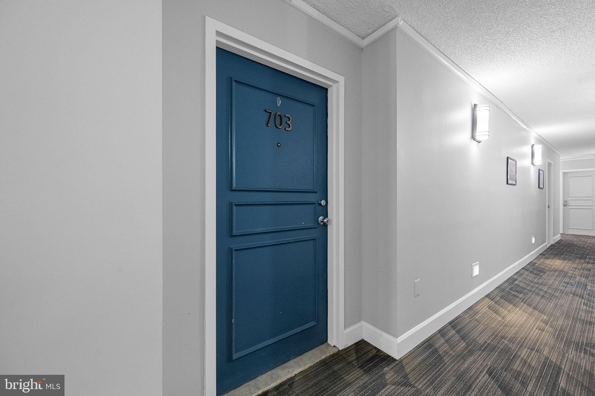 1515 South Arlington Ridge Road, Unit 703 Arlington, VA 22202 - Photo 10 of 44 a view of a hallway with wooden floor