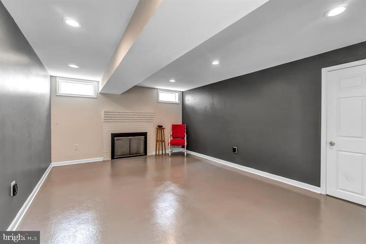 10004 Plank Road Spotsylvania, VA 22553 - Photo 16 of 50 Lower level rec room with wood-burning FP