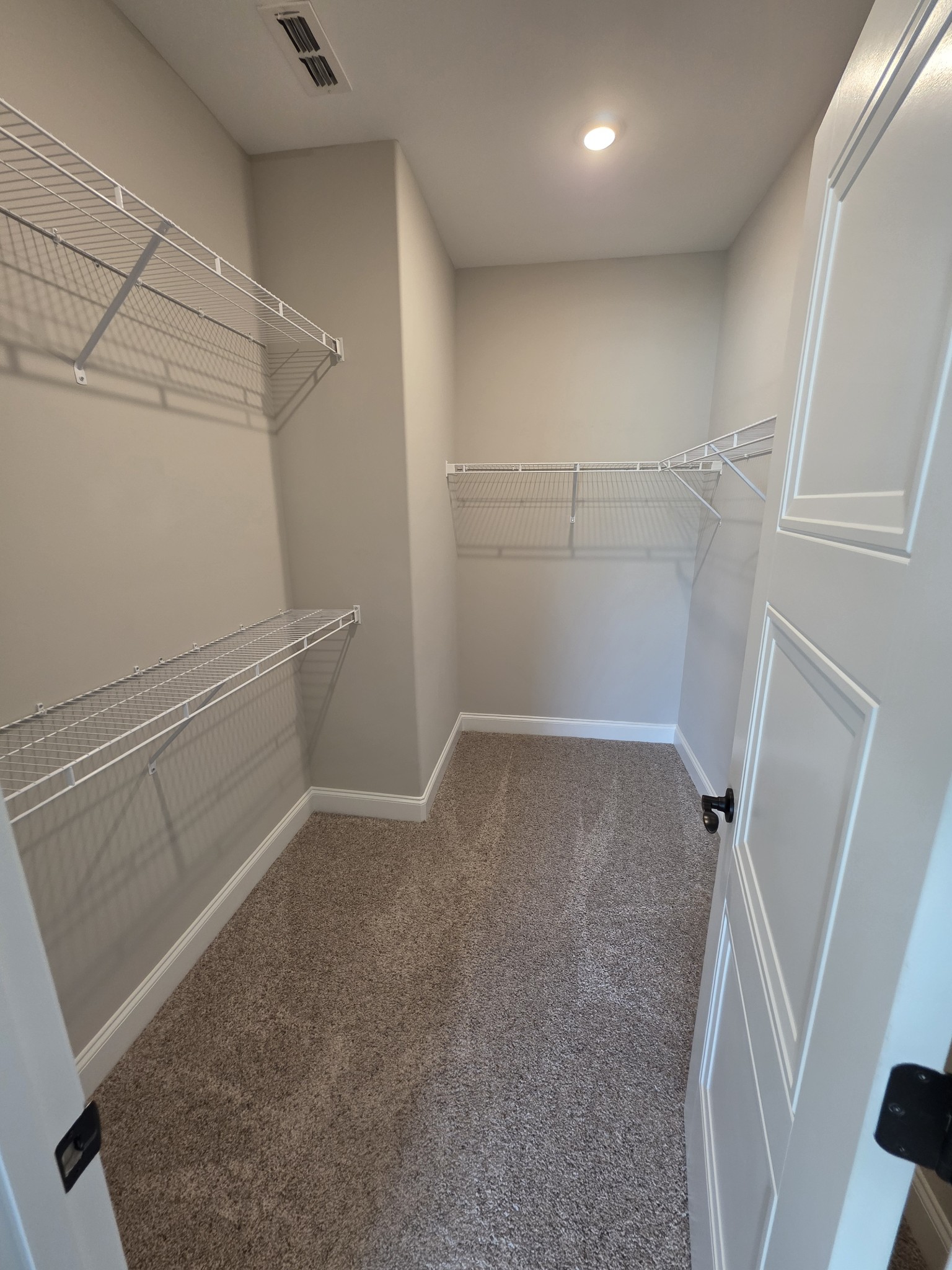453 Ruby Oaks Lane Murfreesboro, TN 37128 - Photo 24 of 34 a view of storage and utility room with empty racks