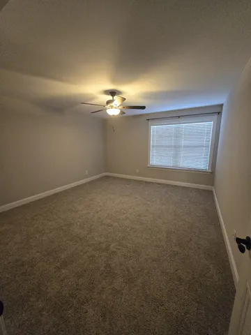 a view of a room with a window