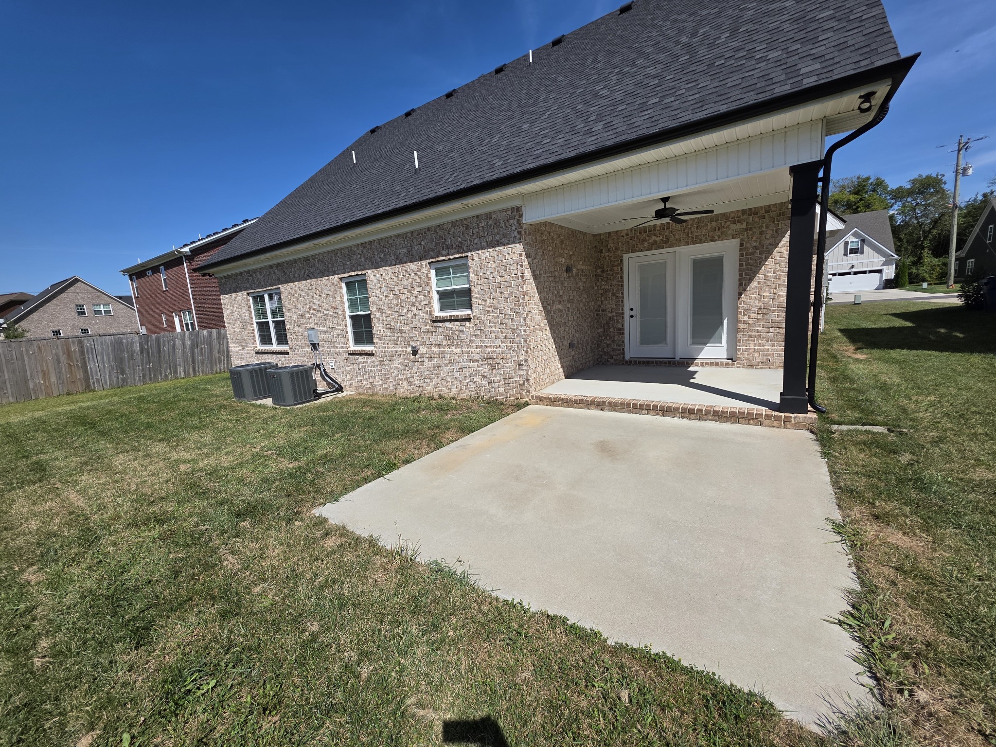 453 Ruby Oaks Lane Murfreesboro, TN 37128 - Photo 32 of 34 a front view of a house with a yard and garage