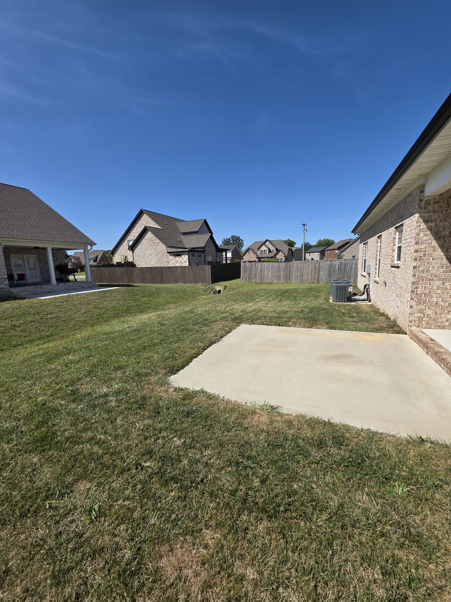 453 Ruby Oaks Lane Murfreesboro, TN 37128 - Photo 33 of 34 a view of a big house with a big yard and large trees