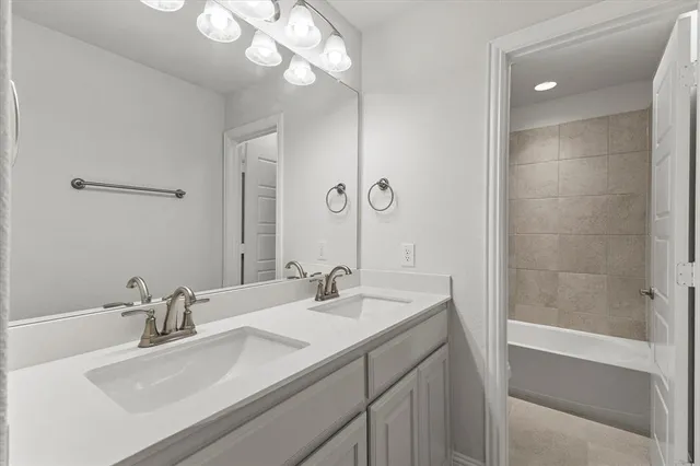 a dining room with furniture a chandelier and wooden floor