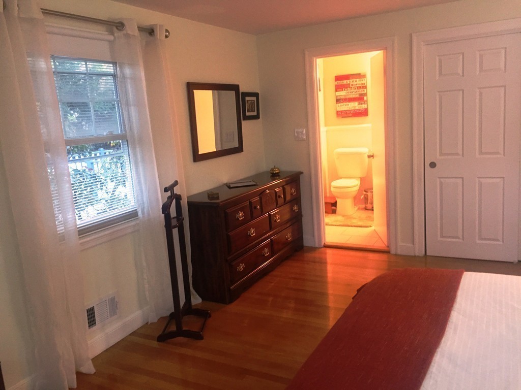 20 Poplar Road Wellesley, MA 02482 - Photo 17 of 27 a living room with furniture and a window