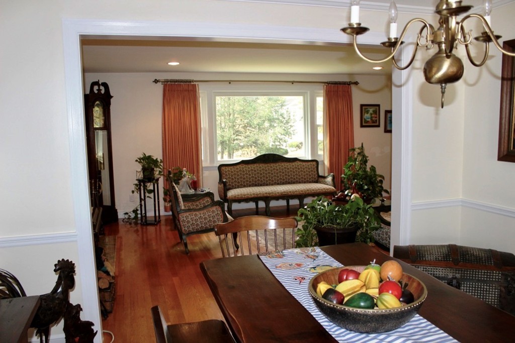 20 Poplar Road Wellesley, MA 02482 - Photo 3 of 27 a view of a dining room with furniture window and wooden floor
