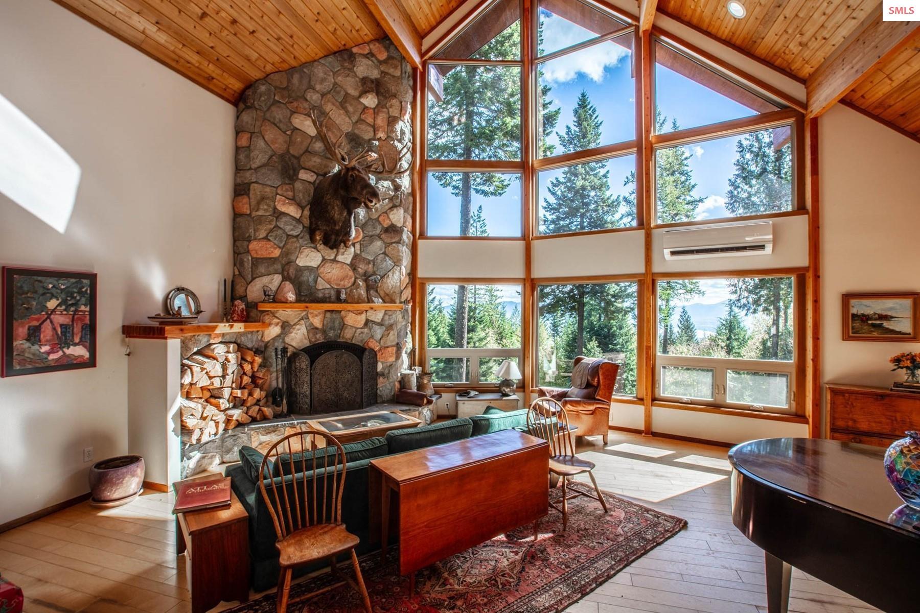 25 Inspiration Way Sandpoint, ID 83864 - Photo 5 of 76 Wood burning fireplace.... (Moosehead is negotiable)